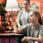 Teen girl distracted and withdrawn instead of doing homework.