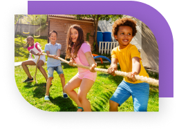 Four kids holding a rope, all pulling in the same direction for tug-of-war.
